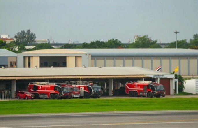 FAA Part 139 fire station with ARFF vehicles.