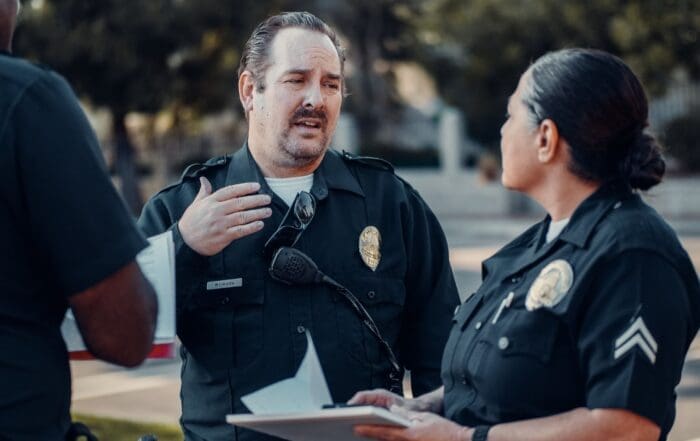 Responding officers establishing unified command on site.